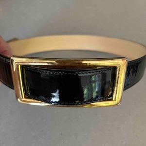 Patent leather belt with gold buckle